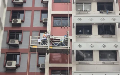 HDB painters on gondola in Singapore exterior repaint