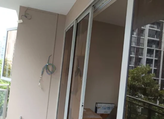 Residential HDB balcony sliding door before brown wall repaint, Singapore
